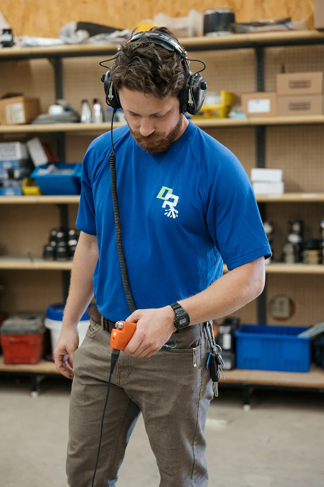 Dr Rooter technician using leak detection equipment